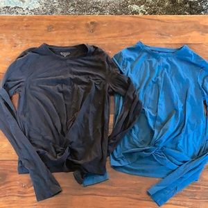 Two athleta long sleeve knot tops size xs